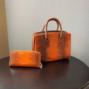 Brand new.  Never worn.  Python purse and wallet